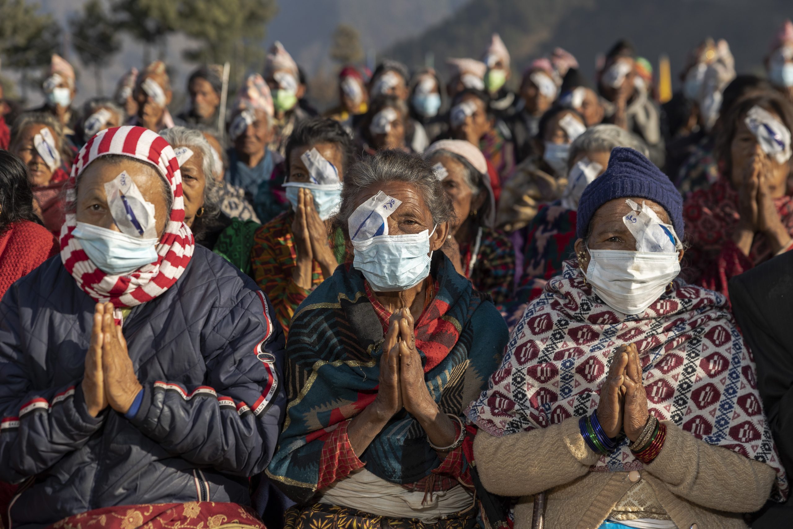 Patients waiting after being cured of cataract blindness